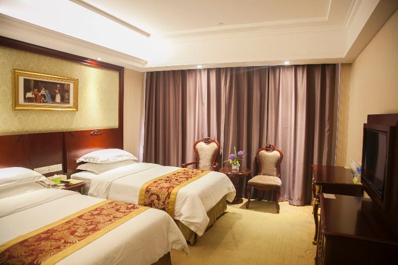 Vienna International Hotel Shanghai Pudong Xiupu Road Exterior photo